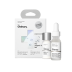 Target & Treat Set packaging box next to a full-size Sulfur 10% Powder-to-Cream Concentrate and a mini Niacinamide 10% + Zinc 1% serum.